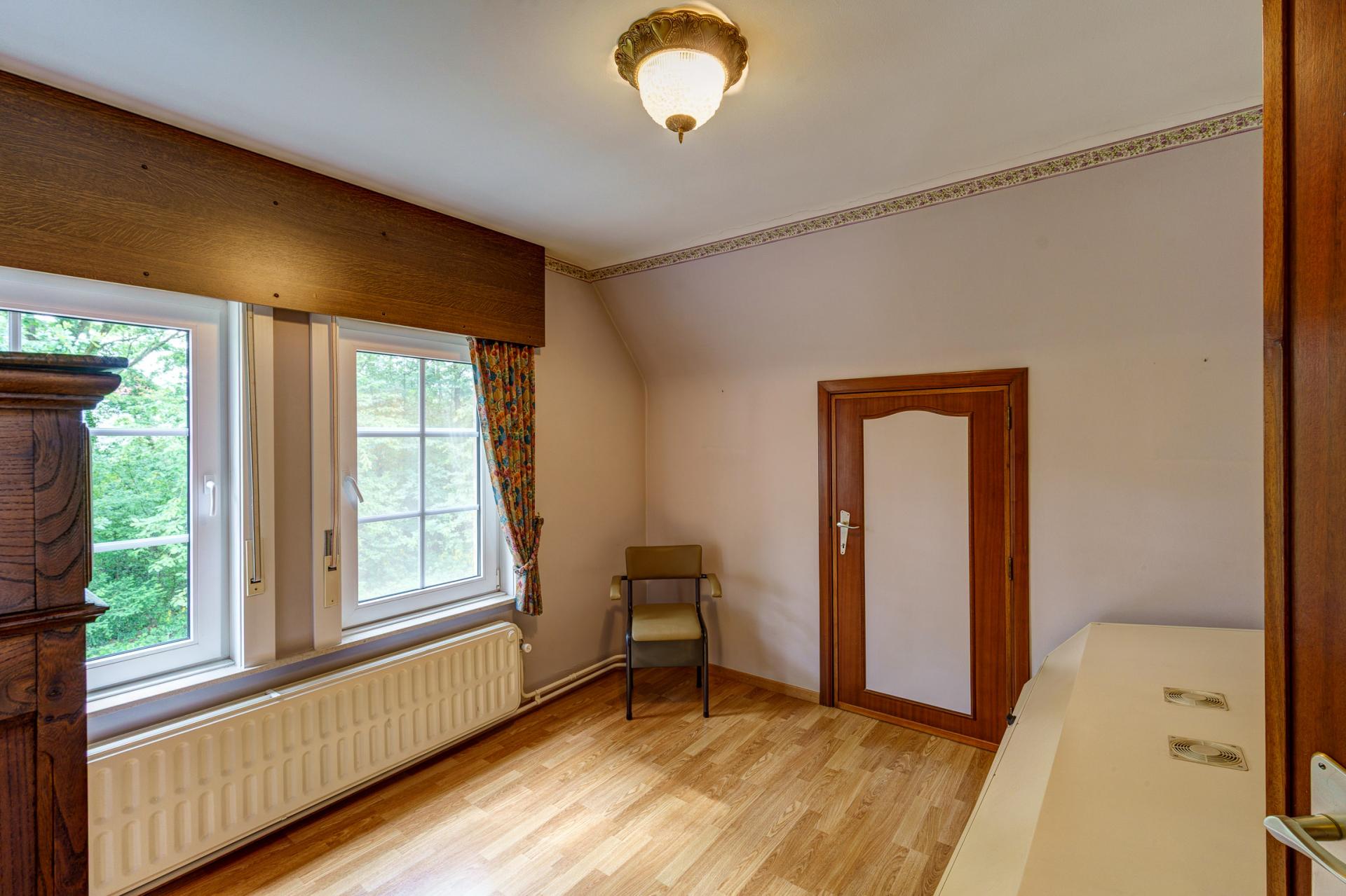 Karaktervolle woning met drie slpk in Rotselaar — foto