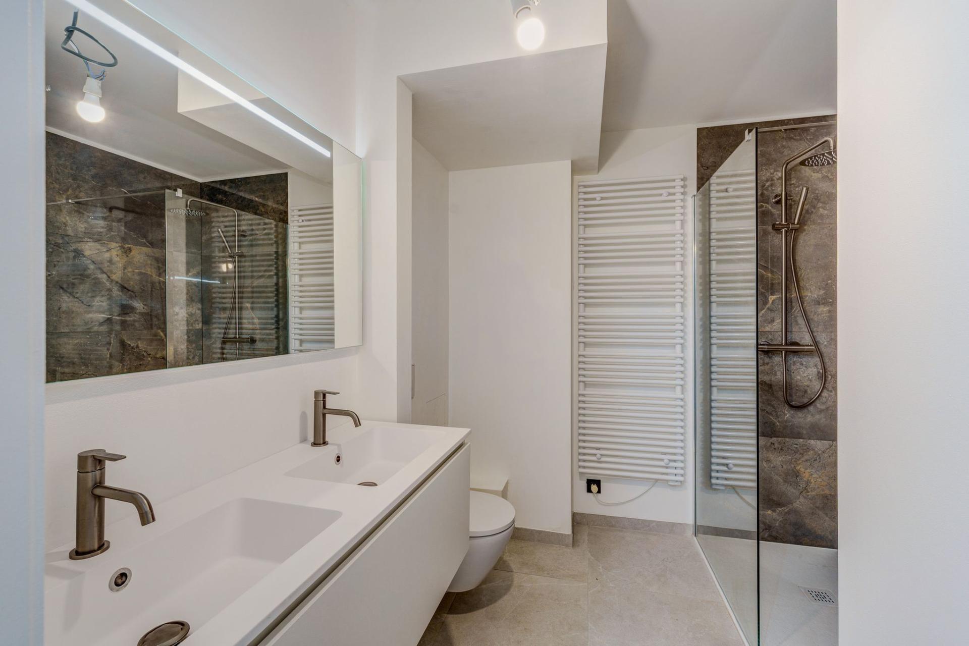 Ruim gelijkvloers appartement met twee slpks in Mechelen — foto