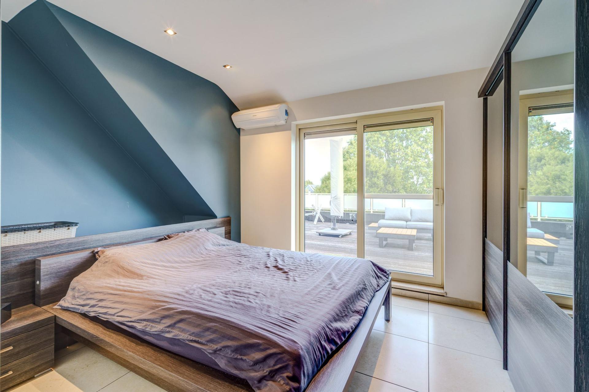 Exclusief penthouse, twee slpks en riant zonneterras in Geel — foto