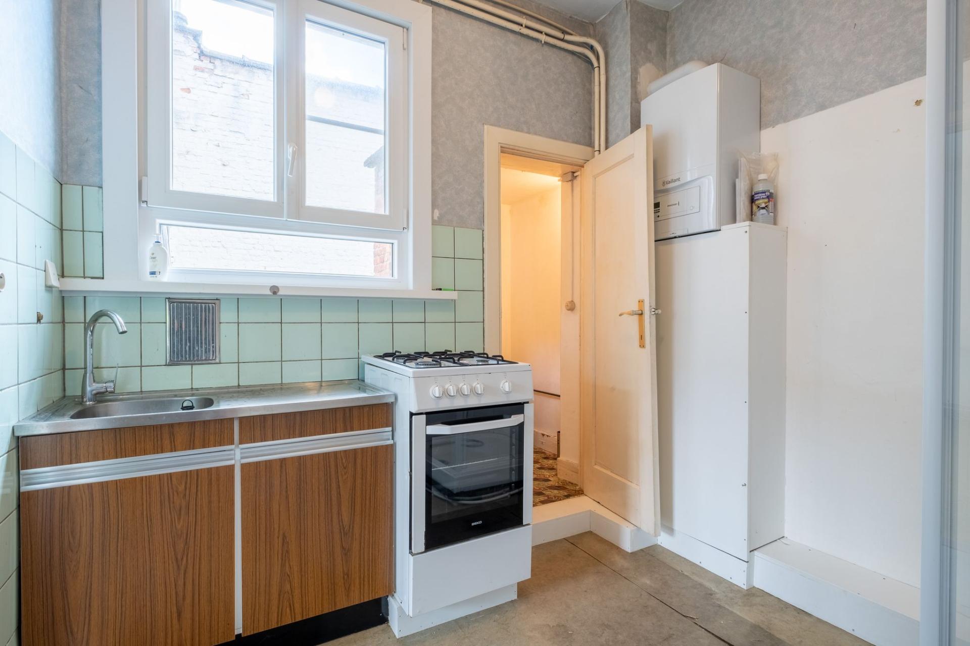 Te renoveren woonhuis en handelspand met veel mogelijkheden! — foto