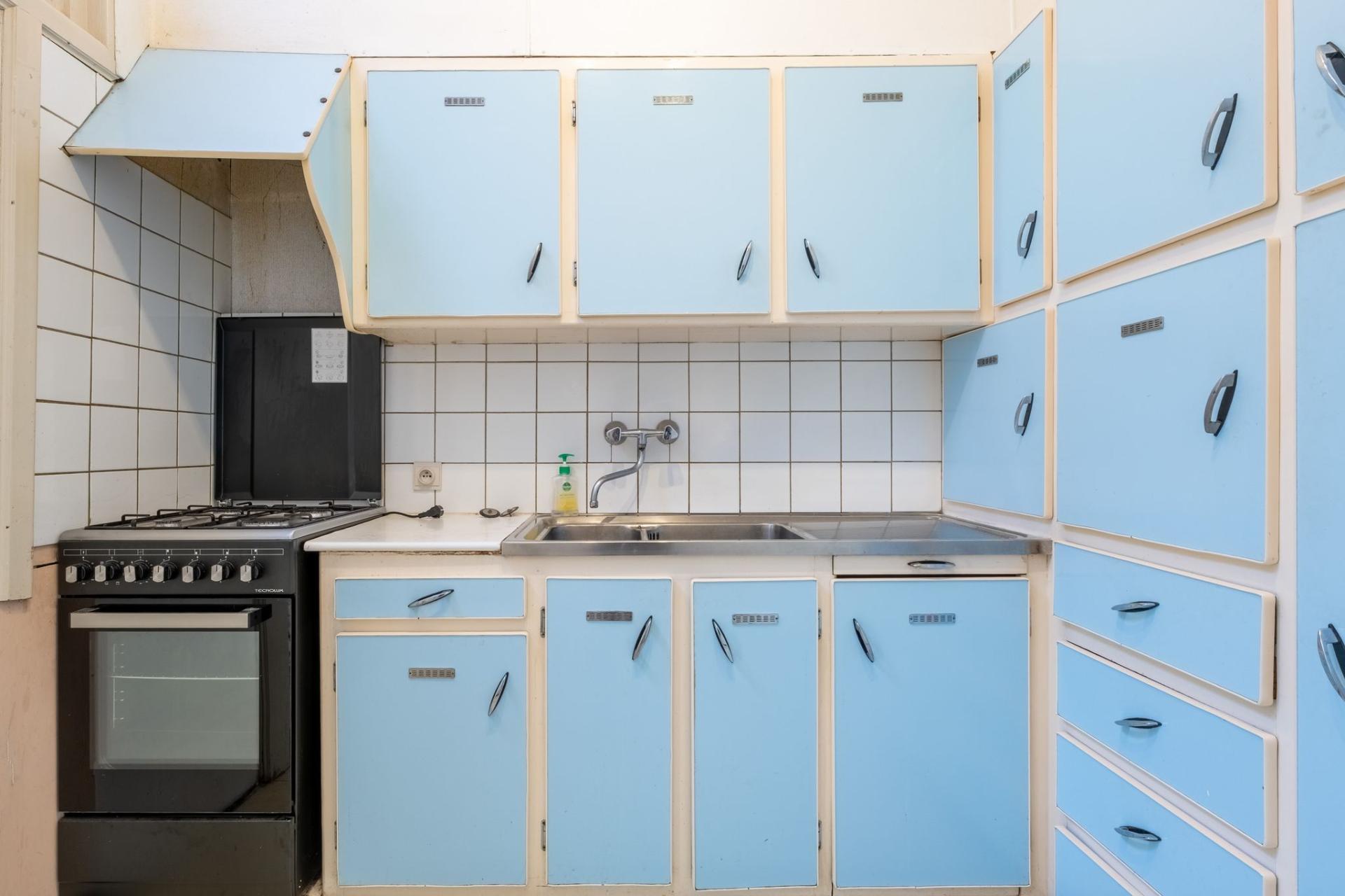 Te renoveren woonhuis en handelspand met veel mogelijkheden! — foto