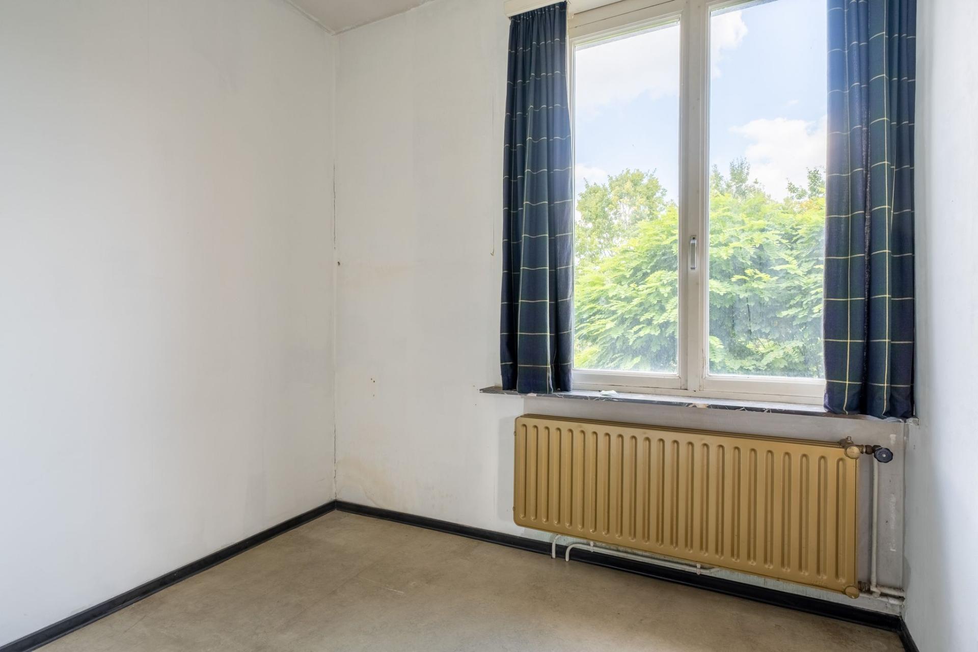 Te renoveren woonhuis en handelspand met veel mogelijkheden! — foto