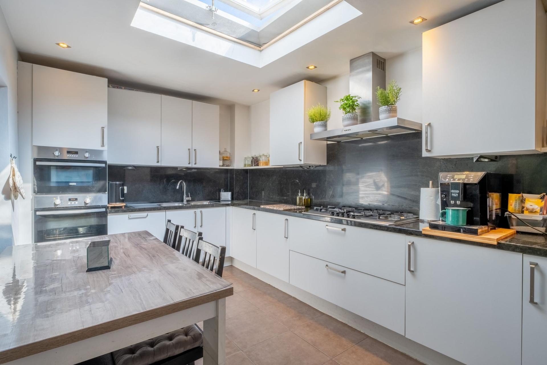 Leuke stadswoning met 4 slpkms en 2 badkamers! — foto