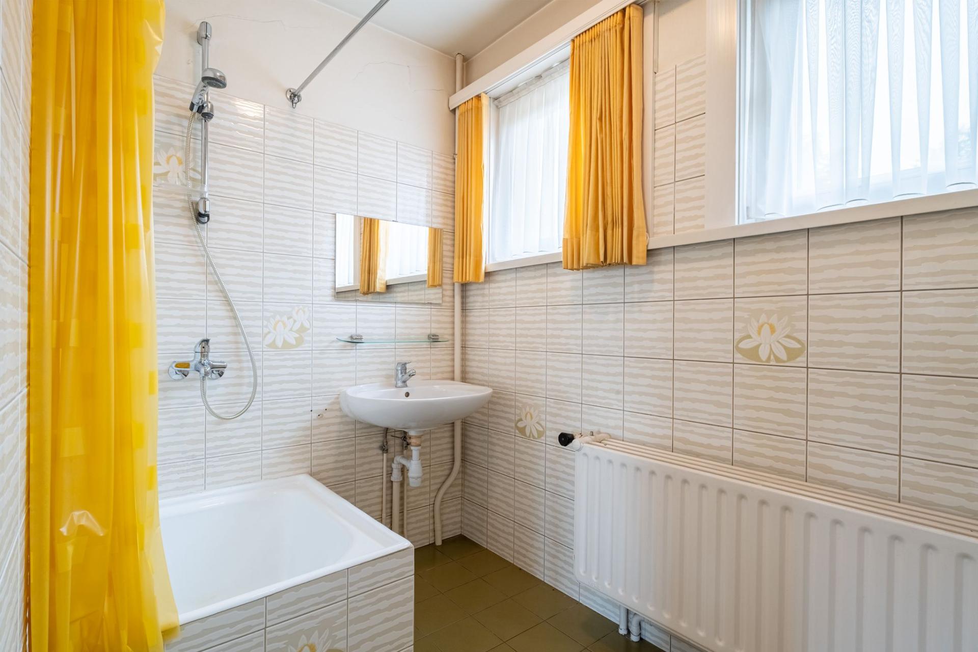 Te moderniseren bel-etagewoning met 3 slpk en tuin in Lier — foto