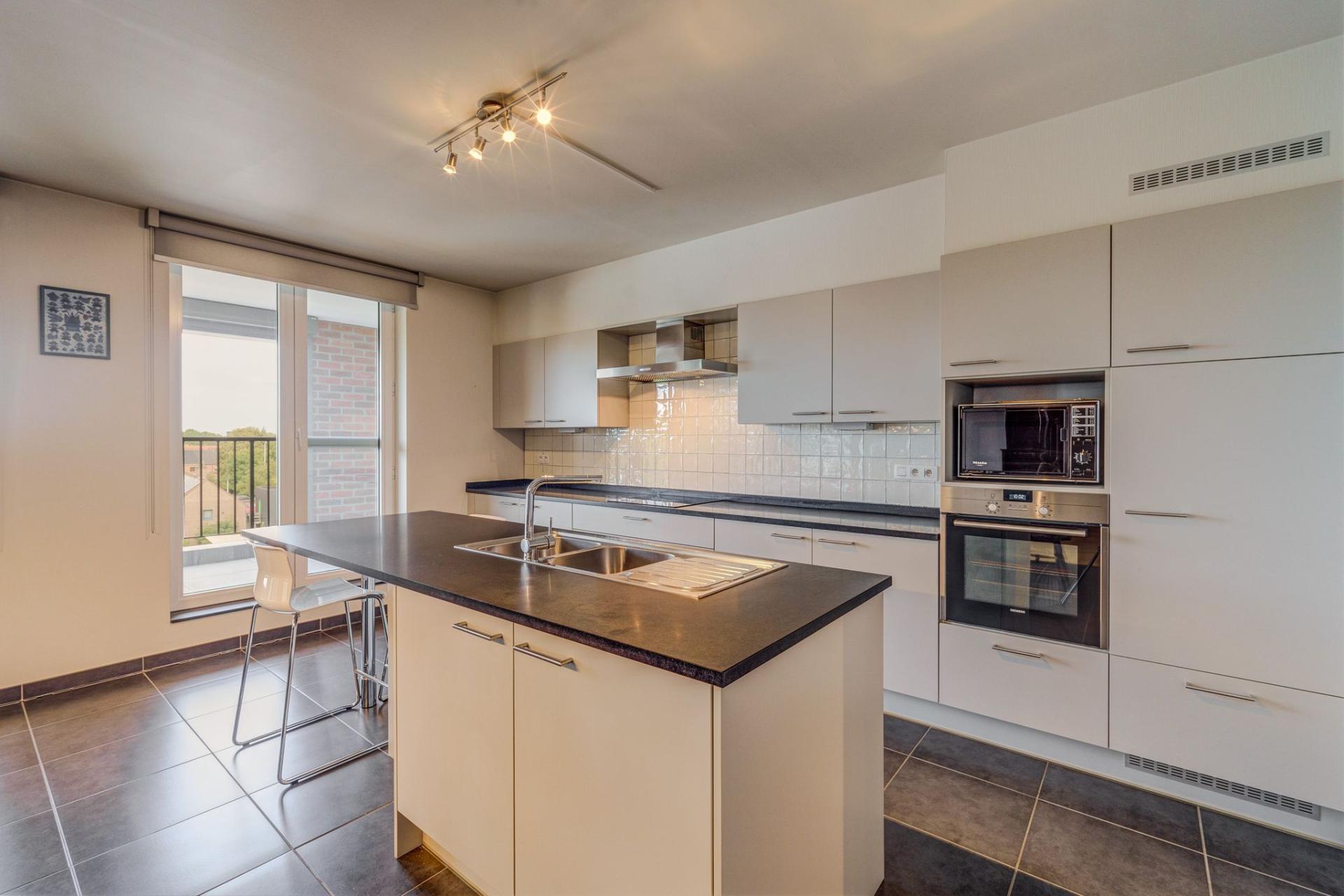 Exclusief apppartement met 3 slpk in Geel centrum — foto