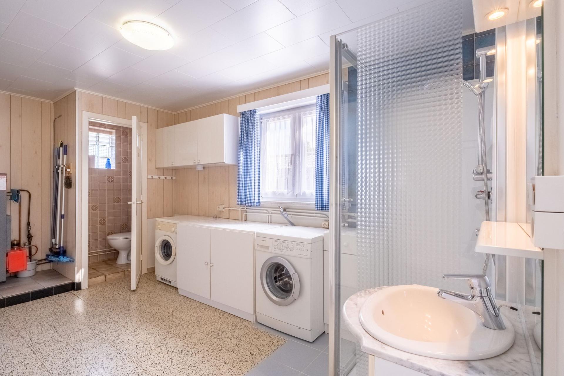 Charmante woning met diepe tuin te koop in Begijnendijk — foto