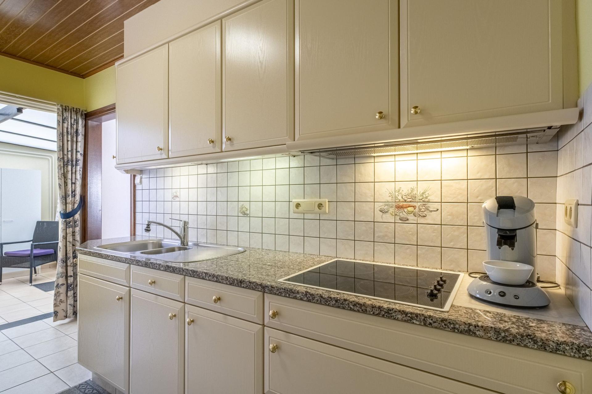 Charmante woning met diepe tuin te koop in Begijnendijk — foto