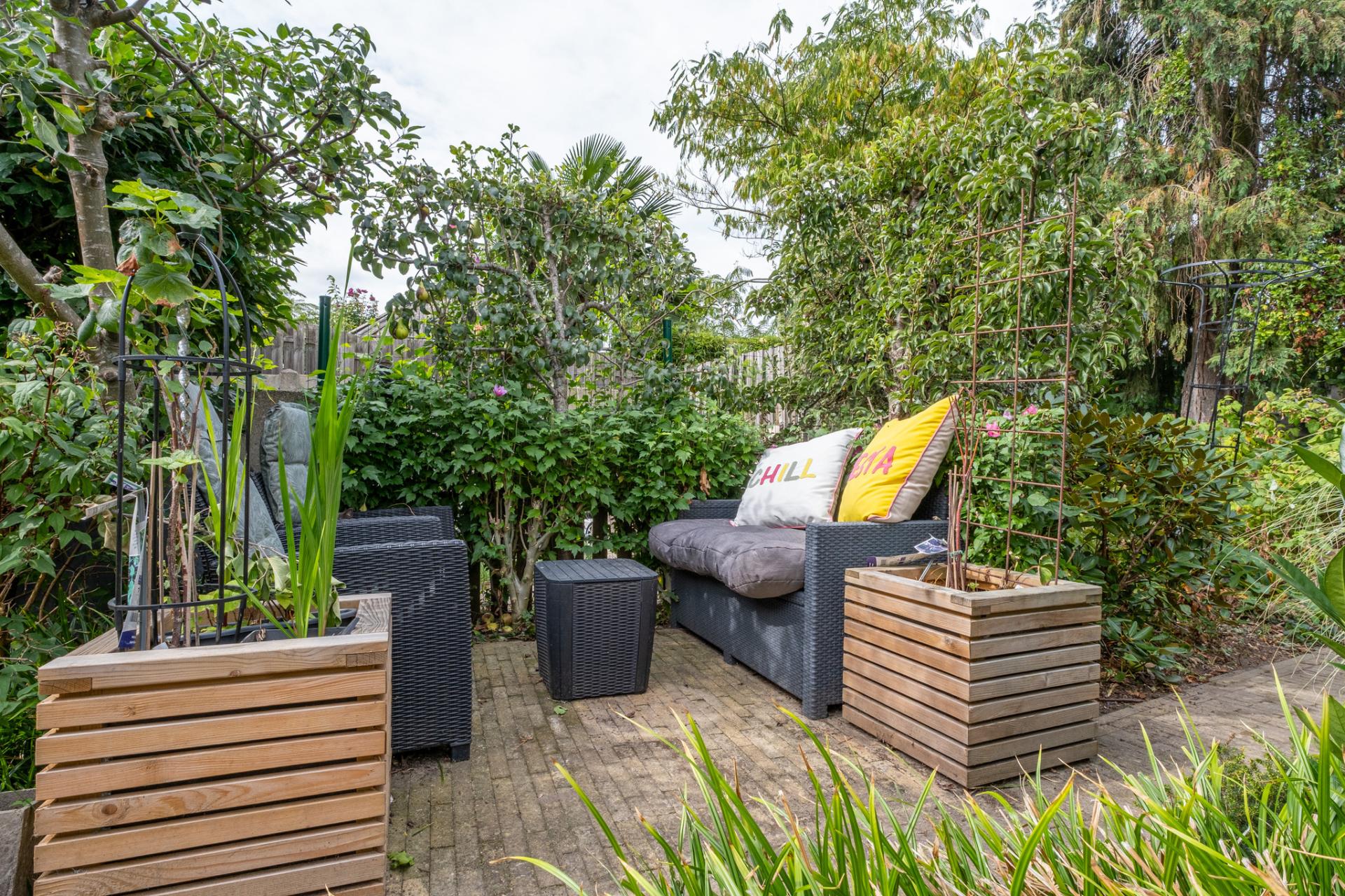 Instapklare gezinswoning met 3 slpks en prachtige tuin — foto